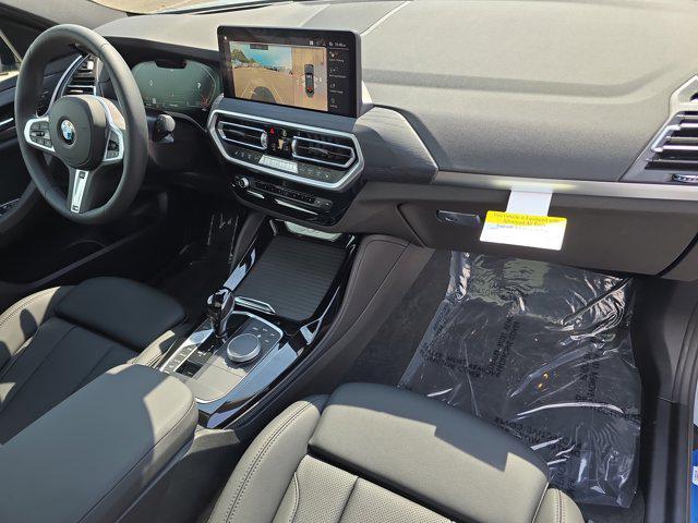 new 2025 BMW X4 car, priced at $67,075
