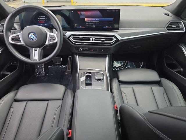 used 2024 BMW 330e car, priced at $43,274