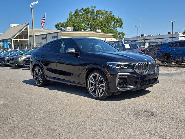 used 2023 BMW X6 car, priced at $71,098
