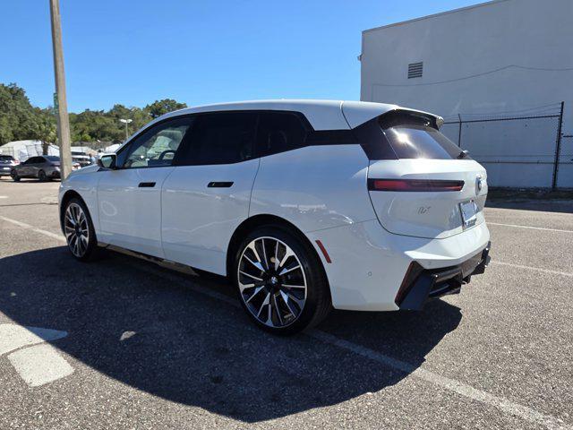 new 2026 BMW iX car, priced at $90,075