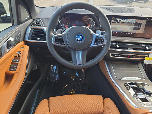 new 2026 BMW X5 PHEV car, priced at $87,475