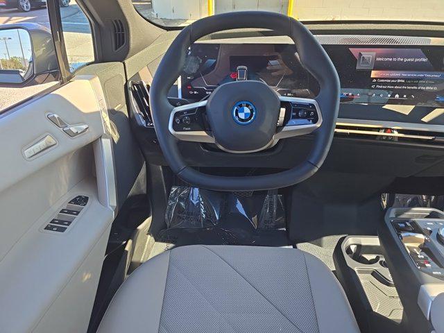 new 2025 BMW iX car, priced at $98,275