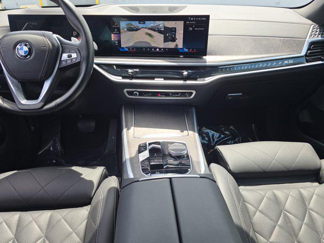 used 2025 BMW X5 car, priced at $53,098