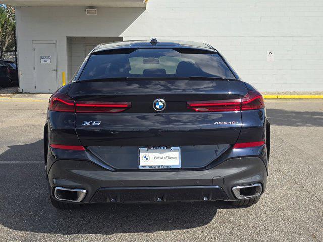 used 2024 BMW X6 car, priced at $72,899