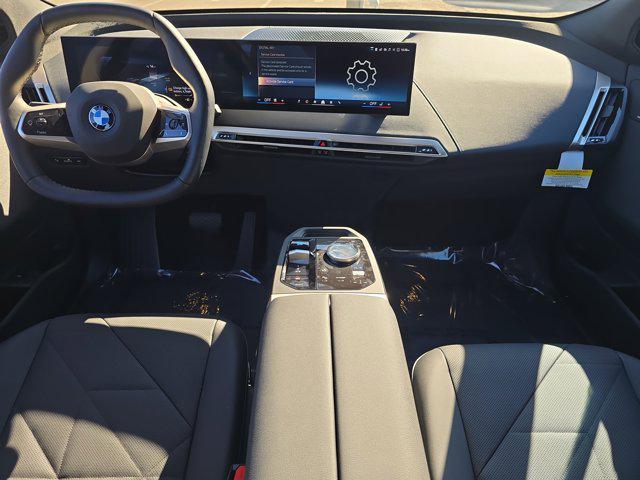 new 2026 BMW iX car, priced at $87,120
