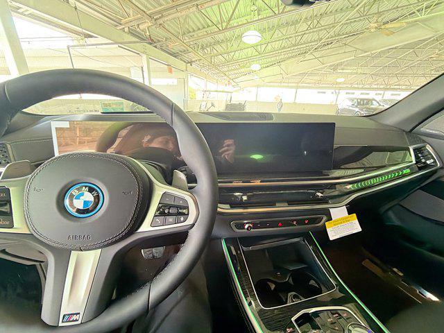 new 2026 BMW X5 PHEV car, priced at $90,625