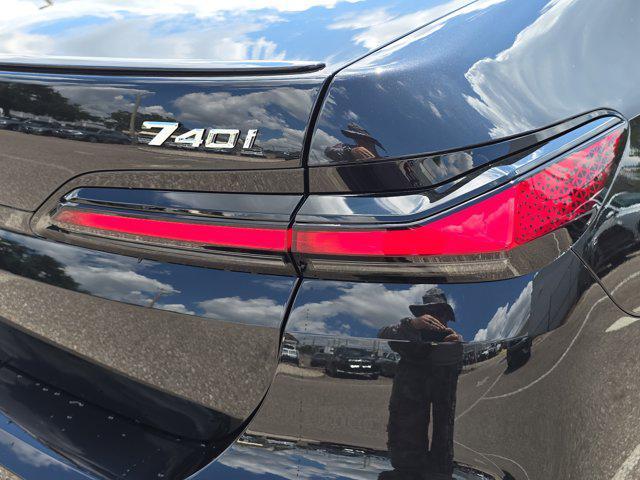 new 2025 BMW 740 car, priced at $104,485