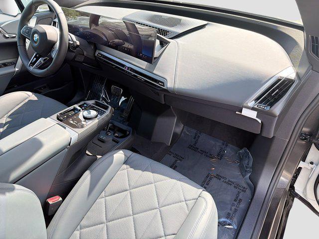 new 2026 BMW iX car, priced at $92,325