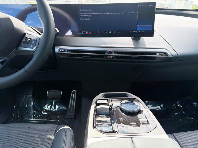 new 2026 BMW iX car, priced at $92,325