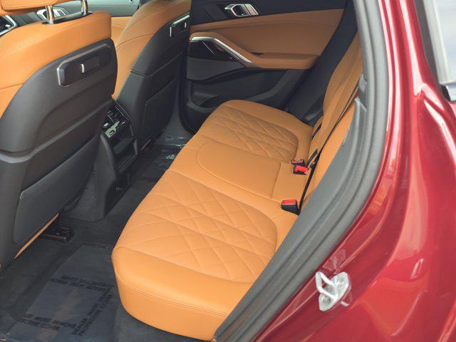 used 2025 BMW X6 car, priced at $73,963