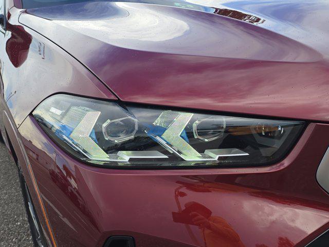used 2025 BMW X6 car, priced at $73,963