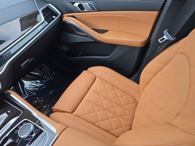 used 2025 BMW X6 car, priced at $73,963