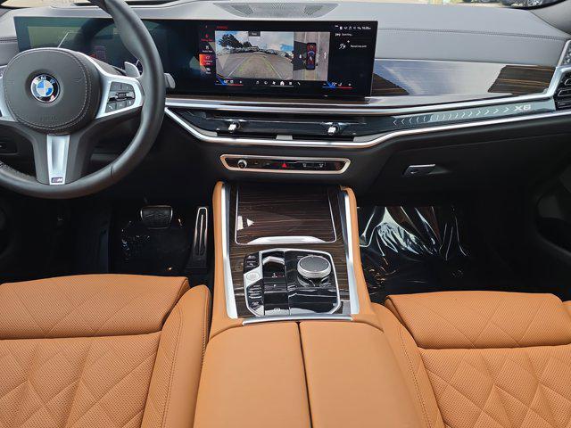 used 2025 BMW X6 car, priced at $73,963