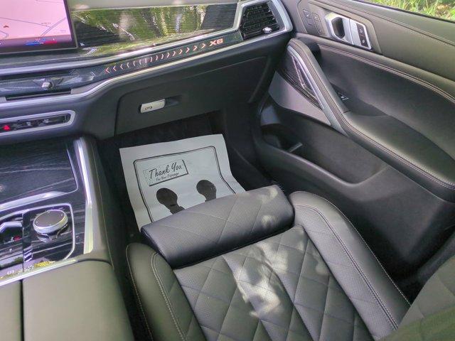 used 2024 BMW X6 car, priced at $74,168