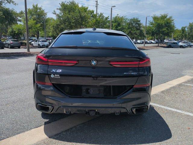used 2024 BMW X6 car, priced at $74,168