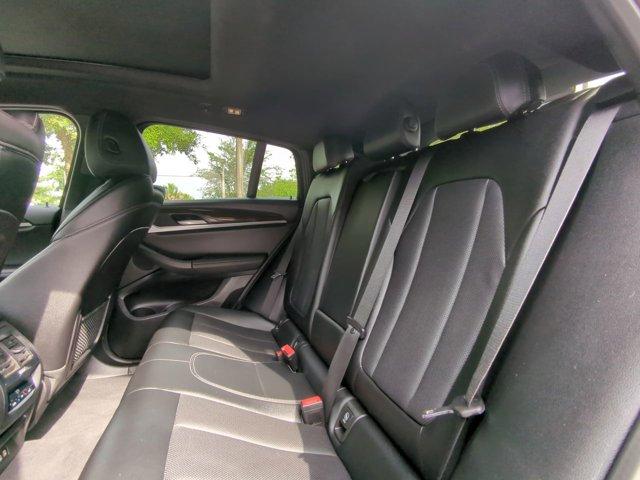 used 2024 BMW X4 car, priced at $40,897