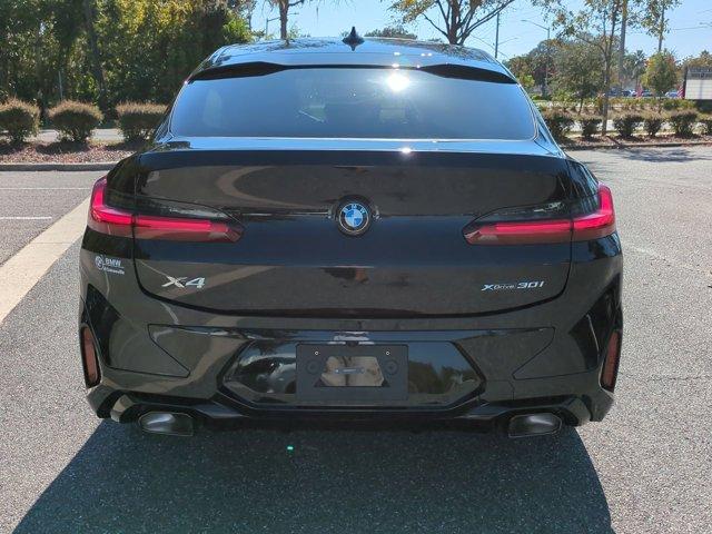 new 2025 BMW X4 car, priced at $64,240