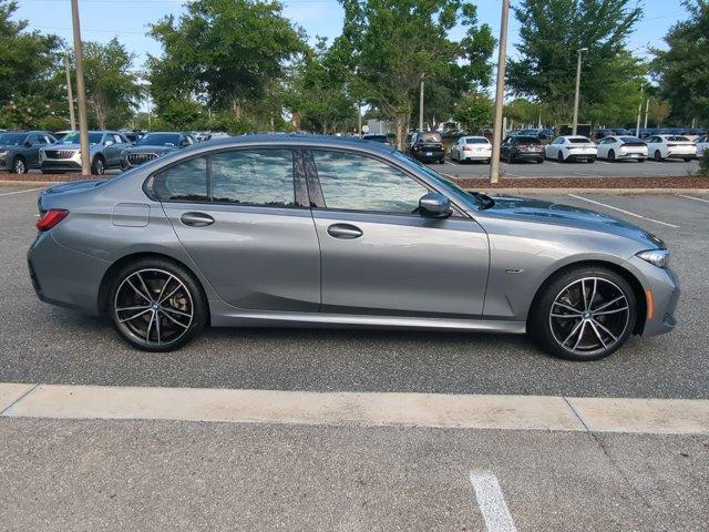 used 2023 BMW 330e car, priced at $30,670