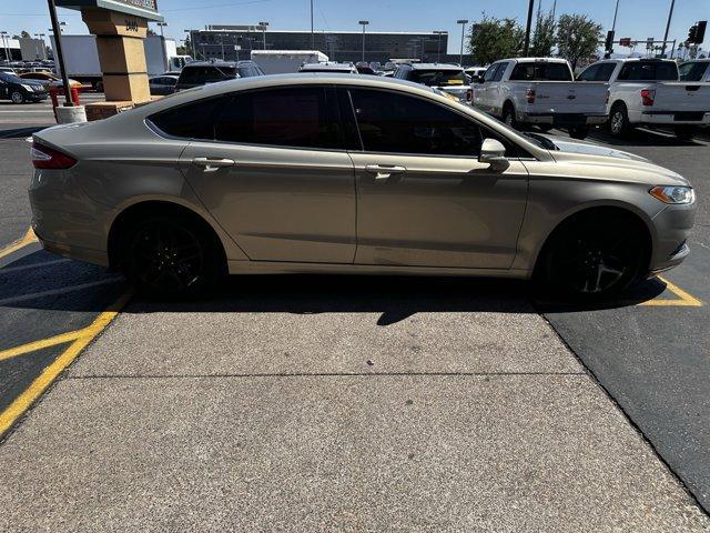 used 2016 Ford Fusion car, priced at $11,995