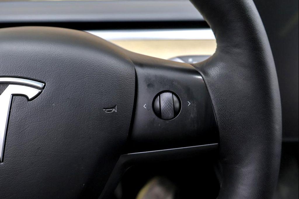 used 2023 Tesla Model 3 car, priced at $24,491