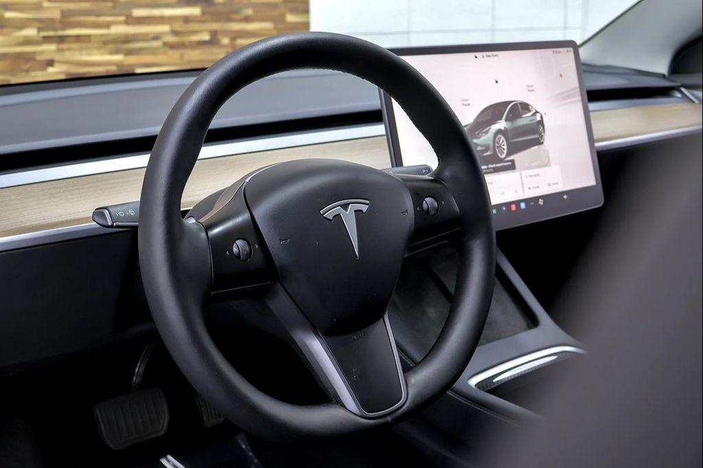 used 2023 Tesla Model 3 car, priced at $24,491