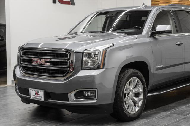 used 2018 GMC Yukon car, priced at $26,693