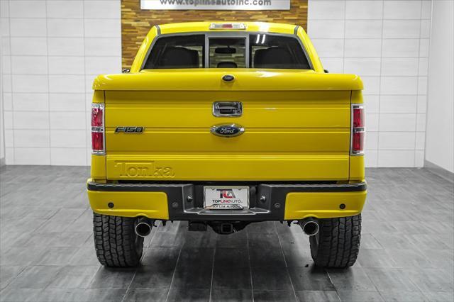 used 2014 Ford F-150 car, priced at $57,491