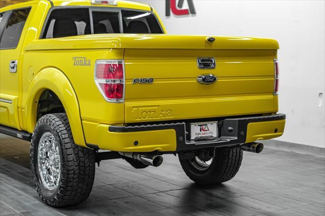 used 2014 Ford F-150 car, priced at $57,491