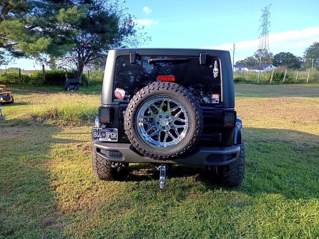 used 2016 Jeep Wrangler Unlimited car, priced at $20,944