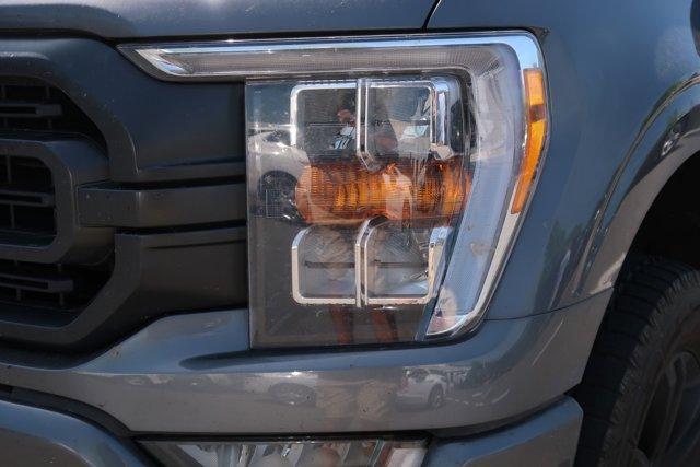 used 2021 Ford F-150 car, priced at $38,466