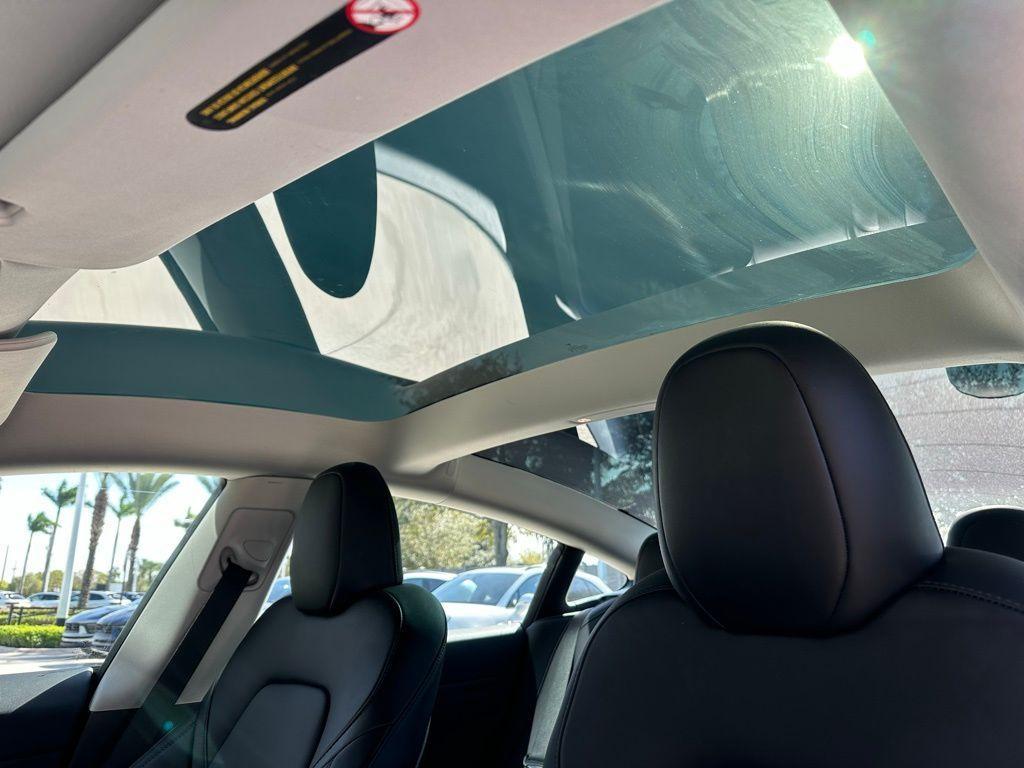 used 2023 Tesla Model 3 car, priced at $20,995