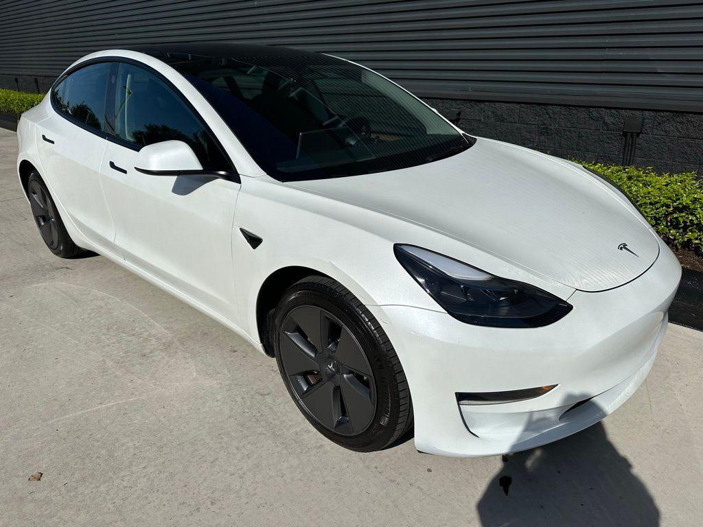 used 2023 Tesla Model 3 car, priced at $20,995