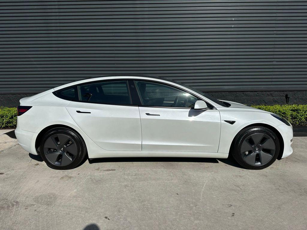 used 2023 Tesla Model 3 car, priced at $20,995