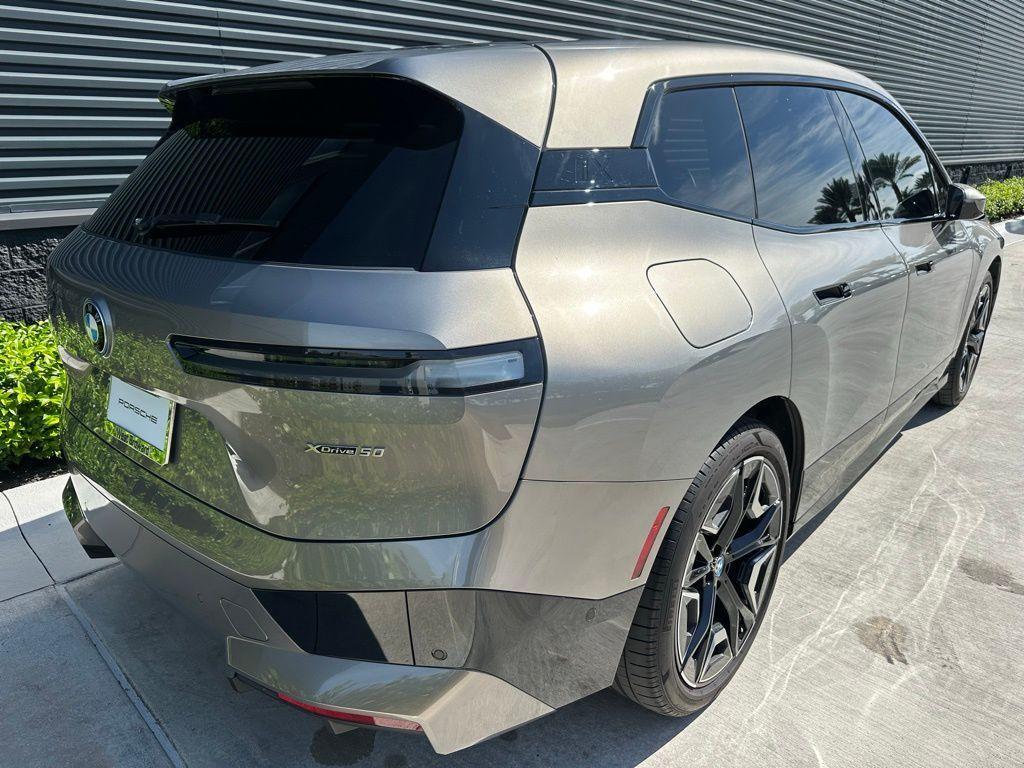 used 2024 BMW iX car, priced at $59,995