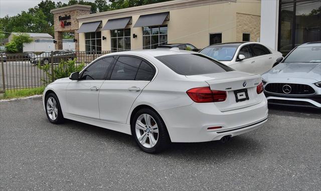 used 2018 BMW 330 car, priced at $15,998