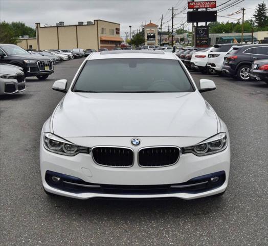 used 2018 BMW 330 car, priced at $15,998