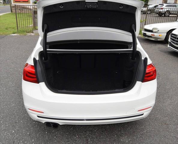 used 2018 BMW 330 car, priced at $15,998