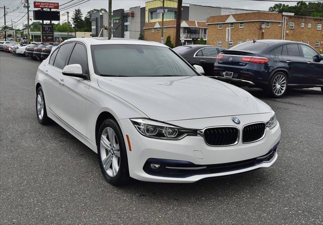 used 2018 BMW 330 car, priced at $15,998