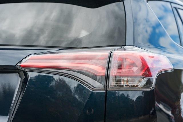 used 2018 Toyota RAV4 car, priced at $15,000