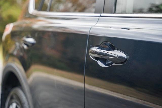 used 2018 Toyota RAV4 car, priced at $15,000