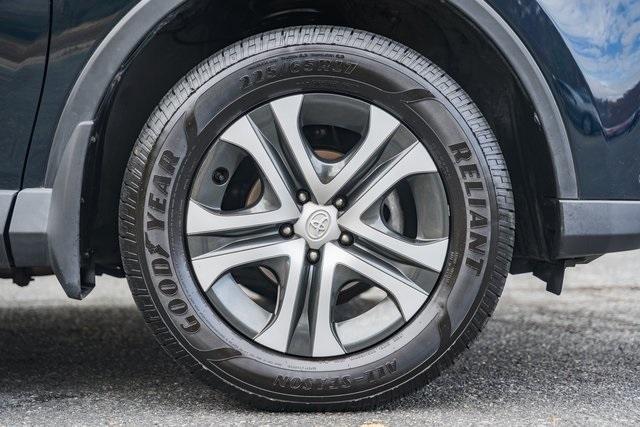 used 2018 Toyota RAV4 car, priced at $15,000