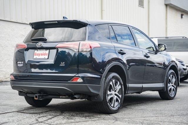 used 2018 Toyota RAV4 car, priced at $15,000
