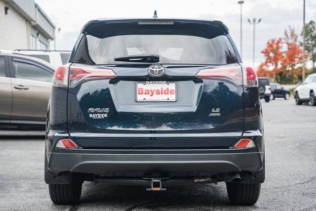 used 2018 Toyota RAV4 car, priced at $15,000