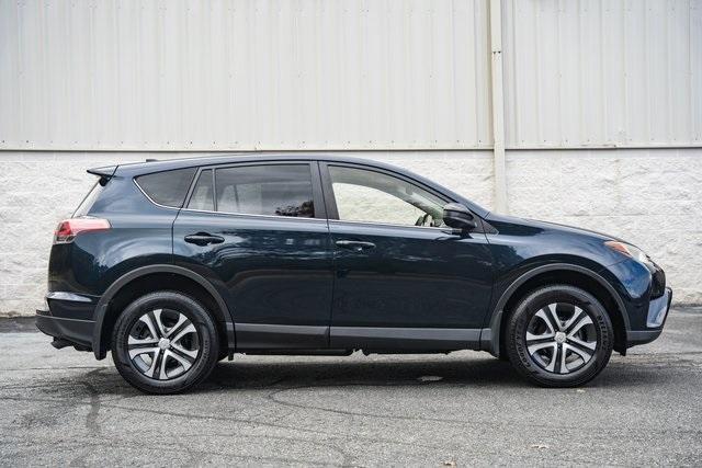 used 2018 Toyota RAV4 car, priced at $15,000