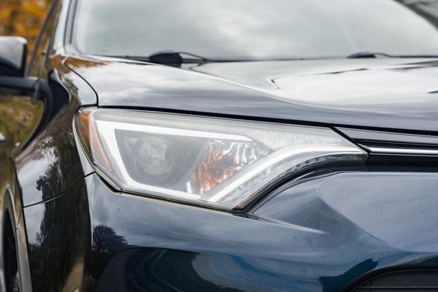 used 2018 Toyota RAV4 car, priced at $15,000