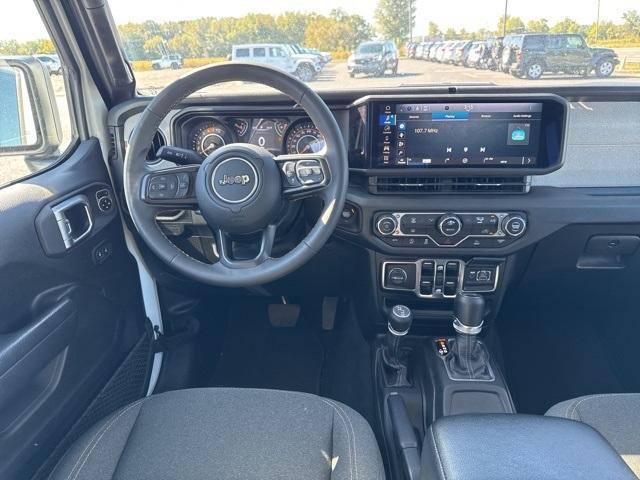 used 2024 Jeep Wrangler car, priced at $34,500