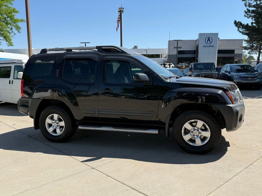 used 2013 Nissan Xterra car, priced at $15,000