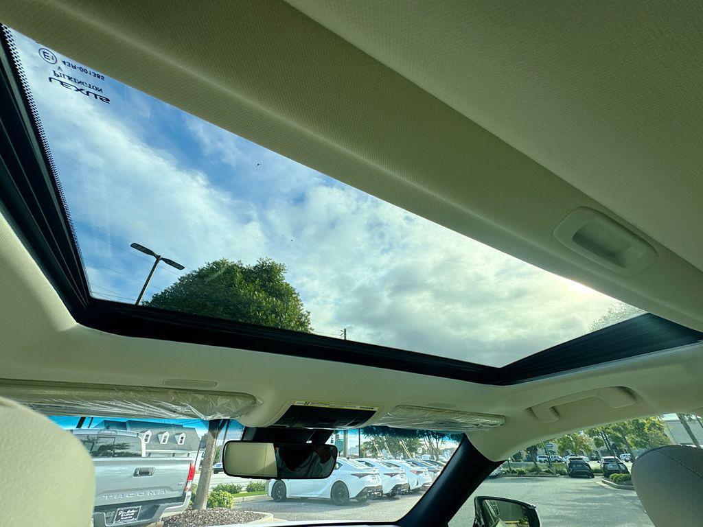 new 2025 Lexus ES 300h car, priced at $53,426