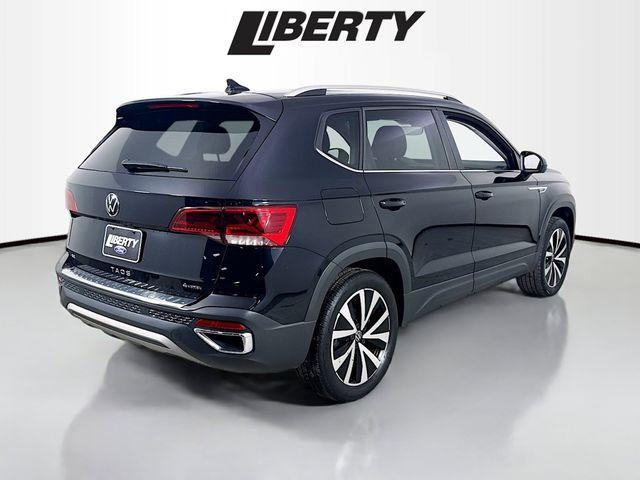 used 2023 Volkswagen Taos car, priced at $21,400