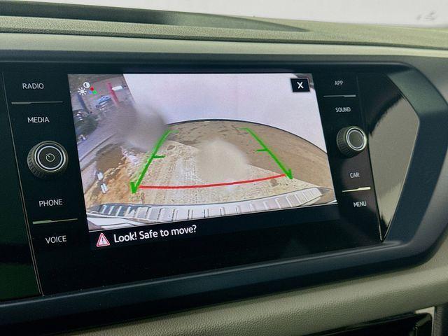 used 2023 Volkswagen Taos car, priced at $21,400